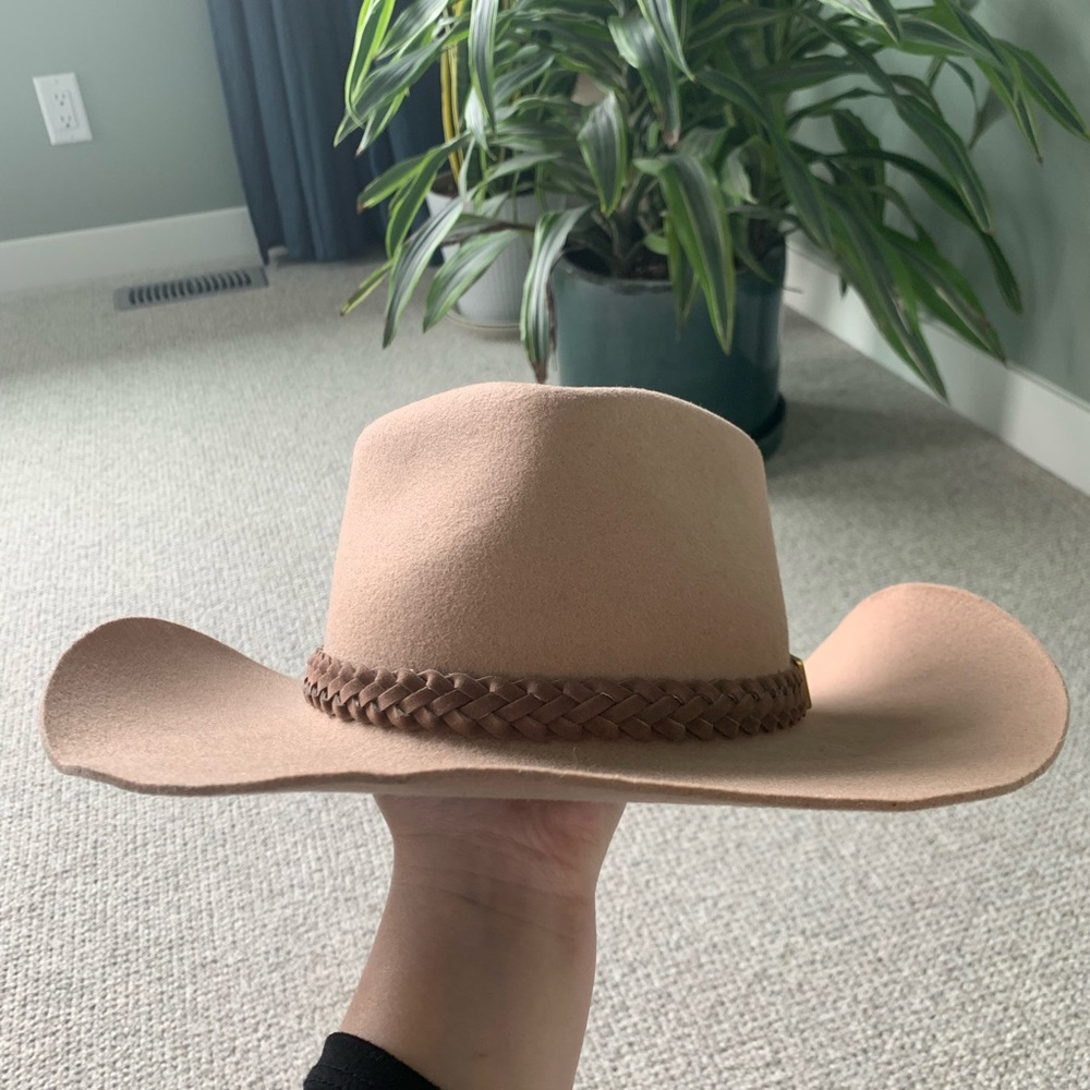 Nice cowboy hat. Just a little too small for me!